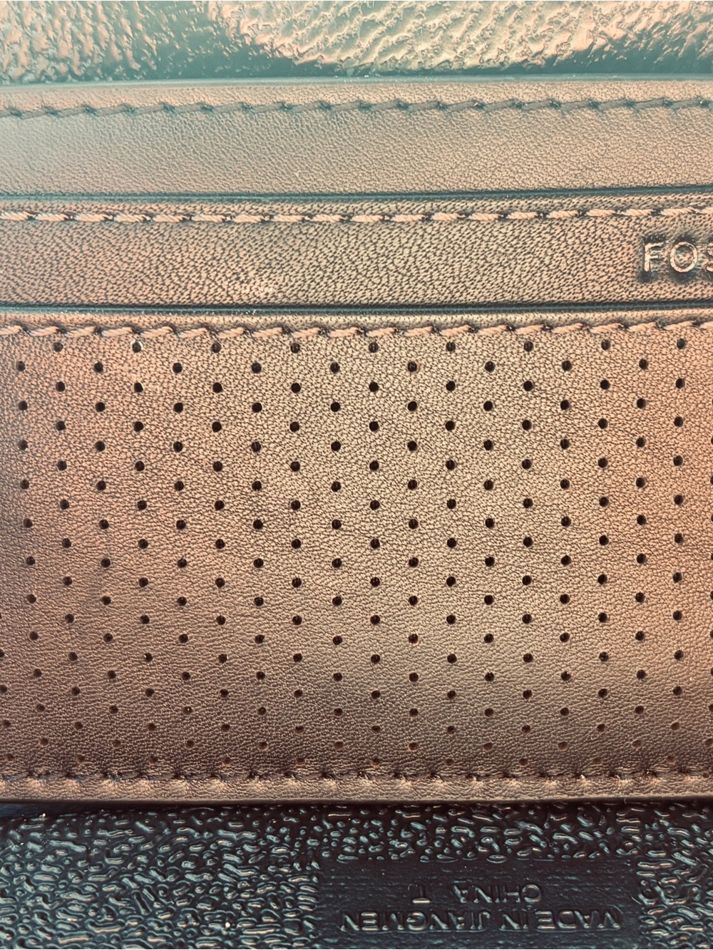 Fossil Black Perforated Leather Card Holder with Red Stitch Accents